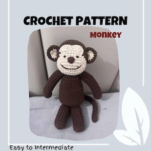 May include: Crochet pattern for a brown monkey amigurumi toy with a white face. The monkey has a brown tail and is sitting on a light brown surface. The text "CROCHET PATTERN" and "Monkey" is visible in the image. The text "Easy to Intermediate" is visible at the bottom of the image.