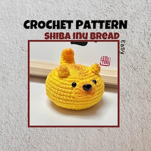 May include: A crochet pattern for a Shiba Inu bread, a cute yellow crocheted dog-shaped bread with black eyes and nose. The pattern is labeled "Easy" and features a red stamp with the Chinese character for "fortune".