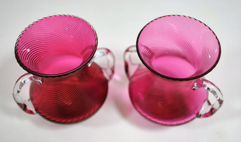 Pair of Swirl Cranberry Threaded Vases Made in Germany Clear Applied Double Handles