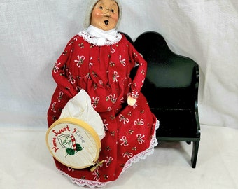 Byer's Choice Carolers Mrs. Claus with "Home Sweet Home" Needlepoint on Bench 1995