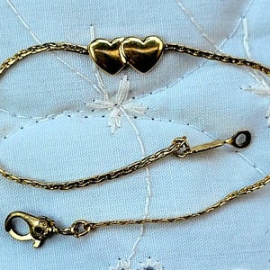 FINAL SALE MONET Dainty Gold Tone Two Connected Hearts Bracelet