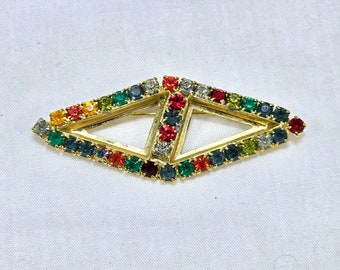 Broche en forma de contorno multicolor con diamantes de imitación en forma de rombo