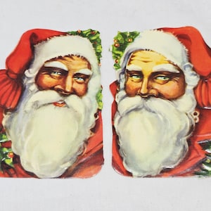 Paire de visages scandinaves du père Noël aux yeux bleus, morceaux de Noël vintage découpés en relief