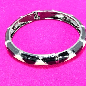 Signed Joan Rivers Black and Beige Enamel Hinged Bangle Bracelet