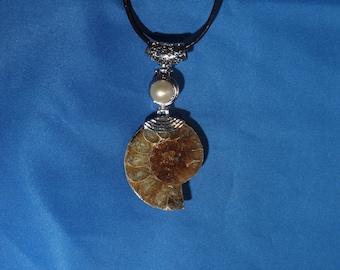 A grade ammonite and natural pearl pendant