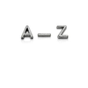 May include: Silver metal letters spelling "A-Z" on a white background. The letters have a textured appearance and are slightly reflective. The "-" symbol is between the letters.