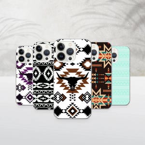 May include: Five phone cases with varied geometric and tribal patterns. The cases feature designs in black, white, brown, purple, turquoise, and orange. The central case displays a bull skull.
