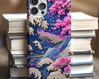 May include: A smartphone case featuring a detailed graphic print of stylised blue ocean waves with white foam crests and vibrant pink cherry blossom branches. The design incorporates flowing lines and deep blue tones, covering the entire back surface.