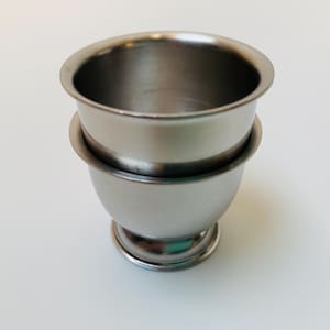 Dinky Danish mid-century modern 1960s vintage stackable Stainless Steel egg cup pair with pedestal feet | Stylish everyday egg cups