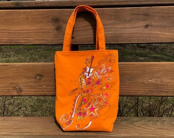 Knitting project bag, orange with guitar and filigree, peacock feather bag, gift for knitters, yarn tote, repurposed clothing