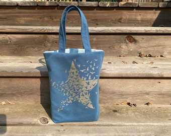midnight teal tote bag, silver star with fluttering birds