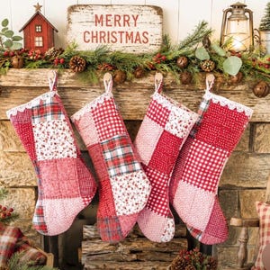 May include: Four quilted Christmas stockings featuring a patchwork design of red and white fabrics in various patterns including gingham, plaid, and floral prints. Each stocking is finished with a white lace trim along the top edge.