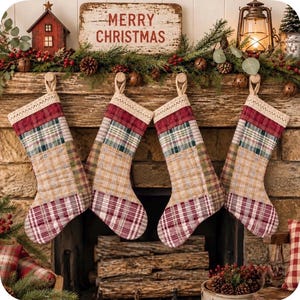 May include: Four quilted Christmas stockings hanging in a row, each featuring a patchwork design of red, green, and tan plaid fabric with a cream-colored lace trim at the top cuff. The stockings are suspended from a rustic wooden fireplace mantel.