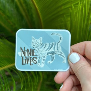 autocollant de chat | Sticker « Neuf vies » de Zazzle.be Liste d'envies Vous avez des idées ? Sticker abstrait animé | Artsy colorés | Ambiance Floride | Sticker pastel | minou |