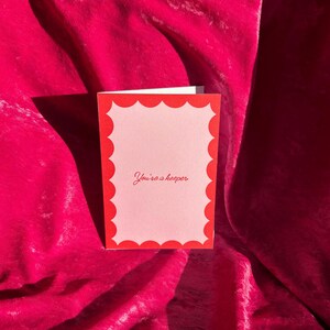 Tarjeta de felicitación ilustrada de San Valentín con el mensaje "Eres un guardián"