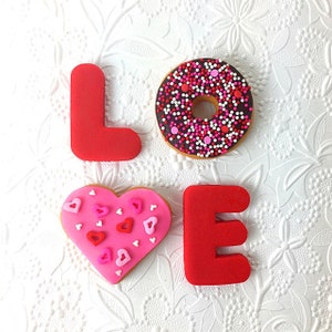 Valentine&#39;s Day Candy - Delicious Marzipan Donuts with the letters L-O-V-E  #LOVEISINTHEAIR