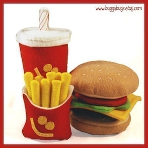 May include: A red and white plush toy cup with a straw, a red and white plush toy box of french fries, and a brown plush toy hamburger with lettuce, tomato, and cheese.