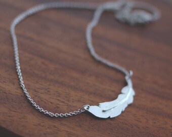 Florida: asymmetrical hand cut sterling silver feather - necklace