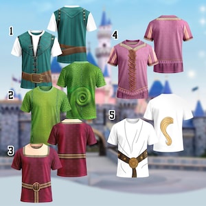 May include: A selection of five short-sleeved t-shirts with character-inspired designs. The shirts feature colours like green, purple, and white, with details such as belts, lacing, and a stylized tail. A castle is visible in the background.