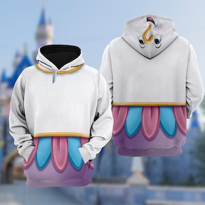 May include: White hoodie with a black-lined hood and a gold-colored trim. The bottom of the hoodie features a design with pink, blue, and purple accents. The hood has a cartoon face design.