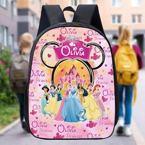 May include: A black backpack with a pink background featuring a castle, Disney princesses, and the name "Olivia." The backpack has a black top and straps, with the word "Princess" repeated.