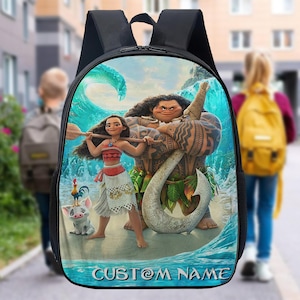 May include: Black backpack featuring a colorful illustration of characters from a popular animated movie. The design includes a wave, a hook, and the text "CUSTOM NAME". The backpack has a top handle and adjustable shoulder straps.