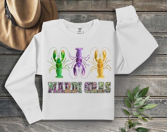 Mardi Gras-langoesten in groen, paars en geel op comfortabele kleuren sweater