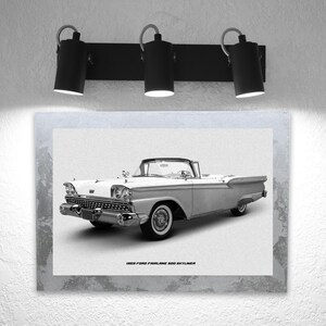 May include: A black and white photograph of a 1959 Ford Fairlane 500 Skyliner convertible. The car is parked on a white background. The text "1959 Ford Fairlane 500 Skyliner" is printed below the car.