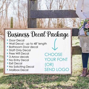 May include: A white sign with black text listing a business decal package. The sign includes a list of decals, such as a door decal, wall decal, bathroom door decal, staff only decal, free wifi decal, 3 arrow decals, no entry decal, exit decal, no soliciting decal, and mailbox decal. The sign also includes instructions to choose a font or send a logo.
