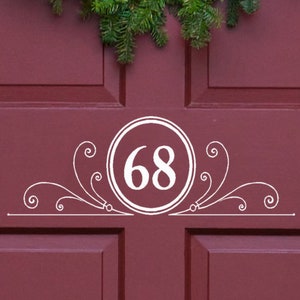 Husnummerdekal i vinyl, present till nytt hem