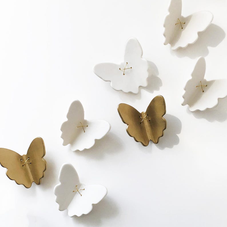 7 ceramic wall art butterflies in white porcelain with some in gold finish