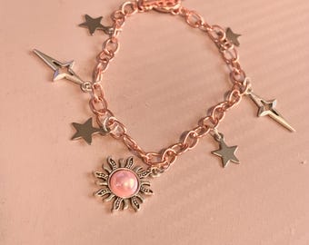 Bracelet soleil en or rose | bracelet étoile | bracelet à breloques en or rose