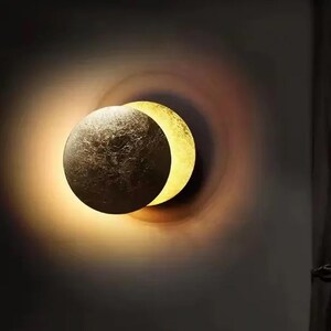 Eclipse Wall Sconce — Designer LED Lamp in Brass, Warm Sculpted Light