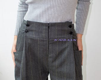 Women's high-waisted pants, wide legs, comfortable pockets, flat waist with button fastening