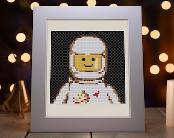 Patrón de punto de cruz de astronauta con bloques de construcción - Diseño de aventura espacial retro - Ciencia ficción con cara de ladrillo