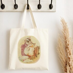 Tom Kitten with his Mom tote bag featuring Beatrix Potter inspired art. Includes nursery story bag, classic novels bag, Beatrix Potter bag, literary mom tote, Beatrix party bag, English classic tote, Beatrix decor bag, nursery theme tote, storybook art bag, Peter Rabbit inspire design, Beatrix Potter theme, and Beatrix Potter fans gift.