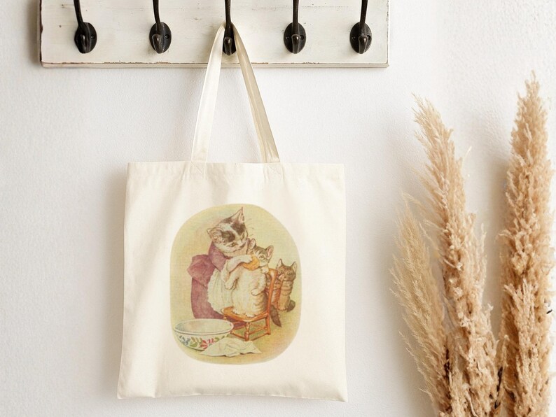 Tom Kitten with his Mom tote bag featuring Beatrix Potter inspired art. Includes nursery story bag, classic novels bag, Beatrix Potter bag, literary mom tote, Beatrix party bag, English classic tote, Beatrix decor bag, nursery theme tote, storybook art bag, Peter Rabbit inspire design, Beatrix Potter theme, and Beatrix Potter fans gift.