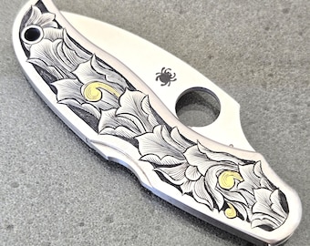 Limited edition of Spyderco Kopa series pocket knife hand engraved with 24k gold inlays