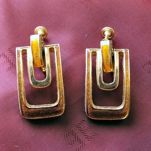 Mid century DG goldtone and orange enameled drop earrings image 1