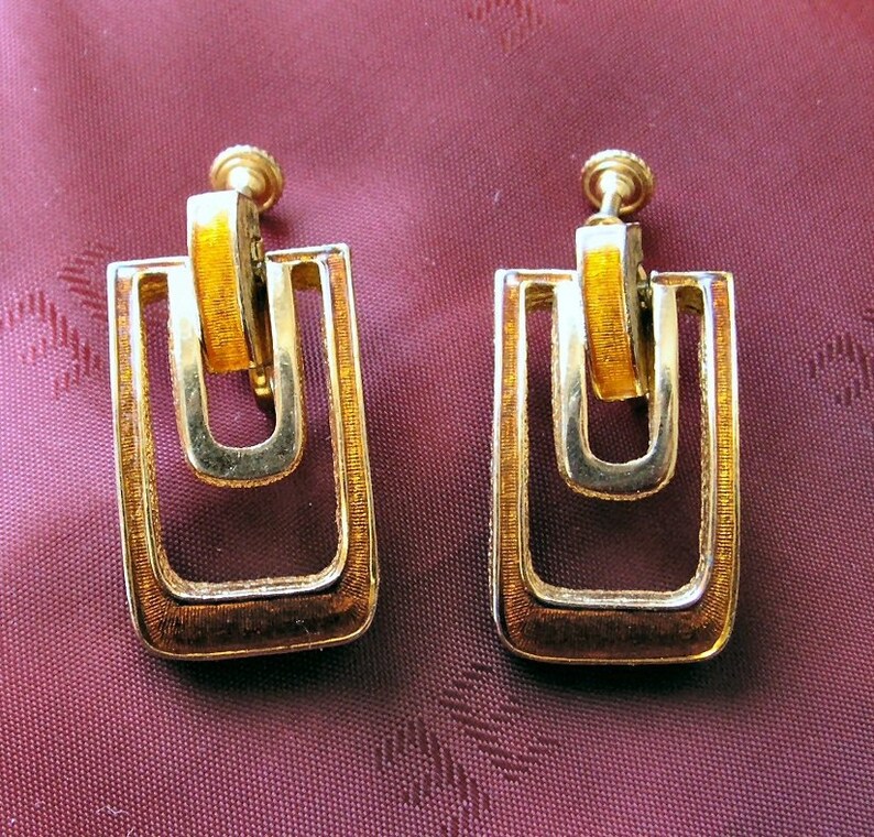 Mid century DG goldtone and orange enameled drop earrings image 1
