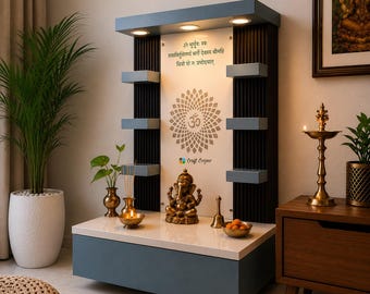 May include: A wall-mounted wooden home temple featuring a blue frame, a white back panel with a gold mandala and Om symbol, and Sanskrit text. It includes three shelves on each side, integrated LED lighting, and a central brass Ganesha statue.