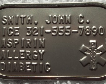 May include: Silver medical alert tag with the text "SMITH, JOHN C. ICE 321-555-7890 ASPIRIN ALLERGY DIABETIC" and a red star of life symbol.