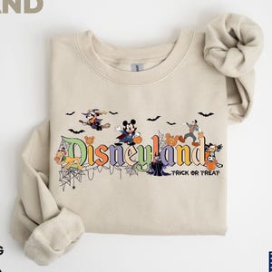 2025 Disneyland Halloween Trick Or Treat Sweatshirt, Disney Halloween Sweatshirt, Mickey And Friends Sweatshirt, Halloween Disney Party