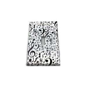 May include: A white light switch cover with a black and white musical note pattern. The switch cover is rectangular and has a single switch.