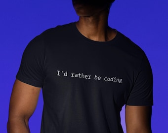 May include: A black t-shirt with the text "I'd rather be coding" printed in white on the front.