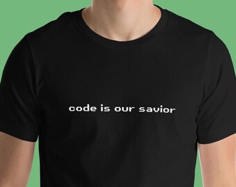 コードは私たちの救世主Tシャツ | 面白いプログラマーTシャツ、テクノロジーユーモア
