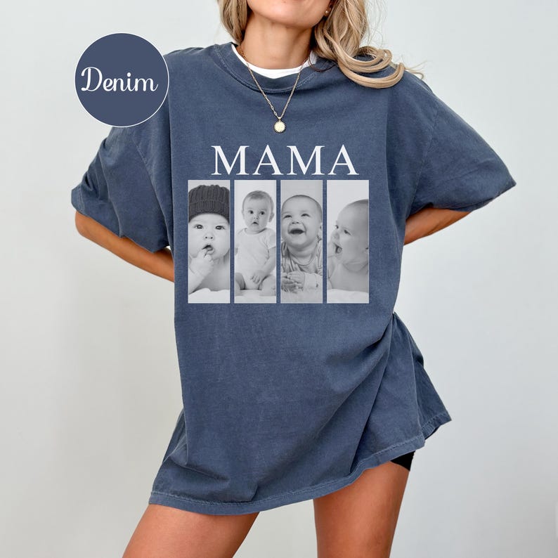 May include: A denim blue short-sleeve t-shirt featuring the word MAMA in white capital letters above four vertical black and white photographic panels, each displaying a different portrait of a baby in various poses and expressions.