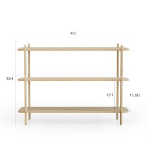 May include: A light-colored wooden bookshelf with three shelves. The bookshelf is 46 inches long, 33 inches high, and 15.5 inches deep. The height between the shelves is 13 inches.
