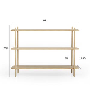May include: A three-shelf wooden shelving unit with rounded edges. The unit is 46 inches long, 33 inches high, and 15.5 inches deep.