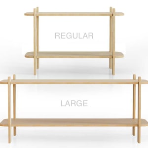 May include: Two wooden shelves, one labeled "REGULAR" and the other labeled "LARGE". The shelves are made of natural wood and have a simple, modern design.
